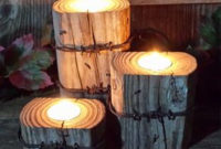 Creative DIY Christmas Candle Holders Ideas To Makes Your Room More Cheerful 15