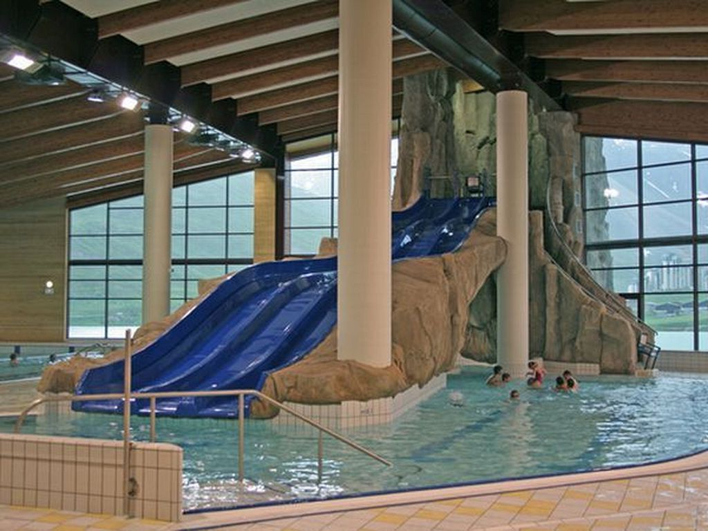 20 Awesome Indoor Swimming Pool Designs With Slide
