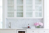 Beautiful White Wet Bar Features Glass Front White