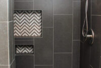 Dark Gray Tiled Shower With White And Gray Chevron Tile