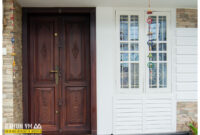 Delicate Front Wooden Door Designs Kerala