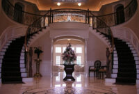 Entryway To A Luxury Home With Grand Staircase And Unique