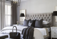 Master Bedroom In Greys And Lavender With Skull Cushion