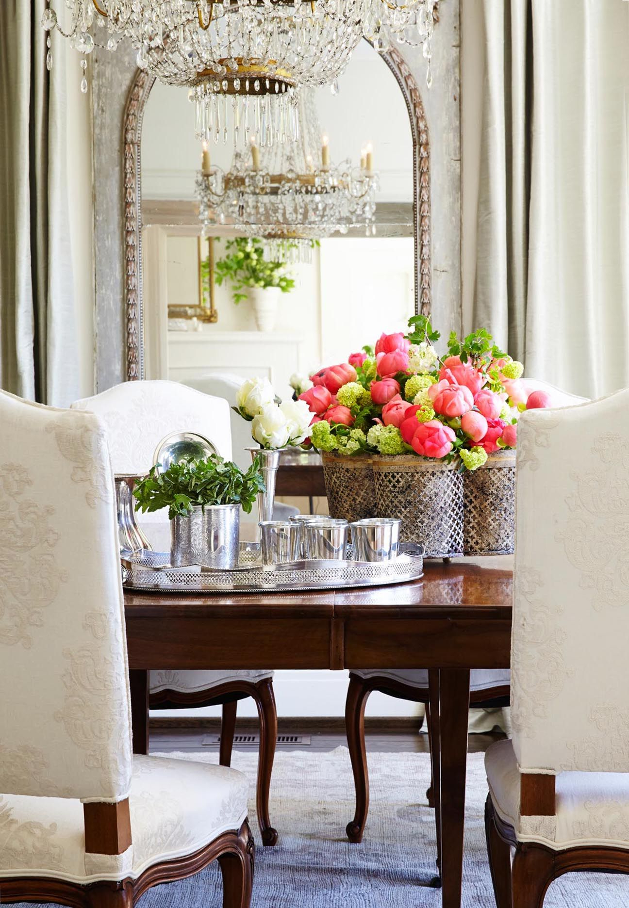 Niermann Weeks Quatrefoil Tole Planter Holds A Colorful Array Of Flowers In This Dining Room