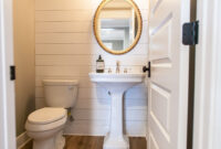 Powder Room With Planked Walls And Vintage Gold Mirror