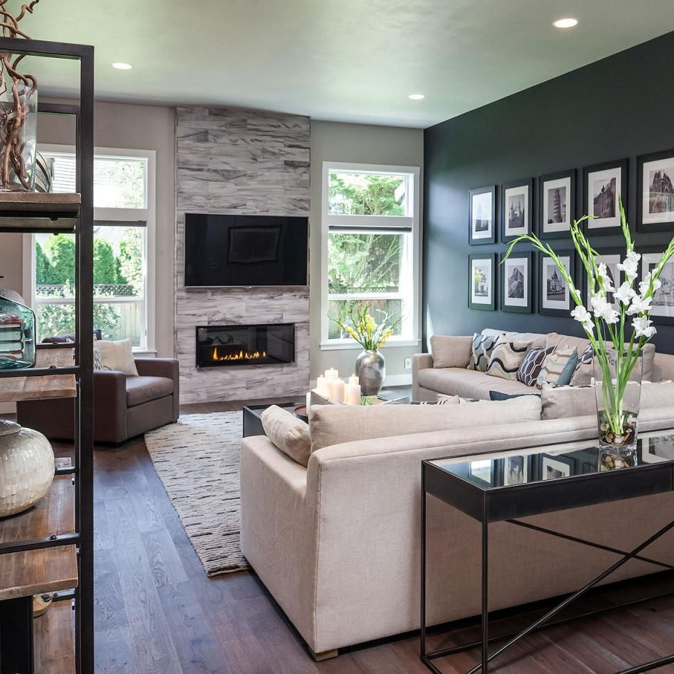 The Dark Accent Wall Fireplace And Custom Wood Floors Add