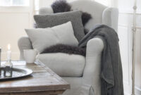 White Sitting Room With Gray Furniture Throw Blankets